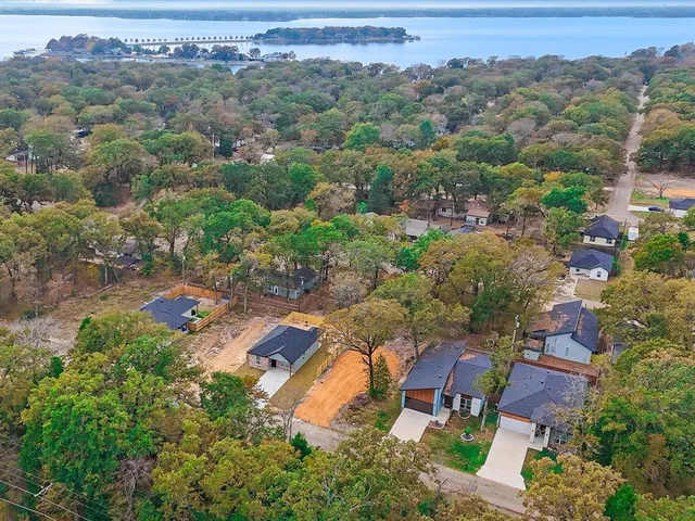 an aerial view of a house with a outdoor space