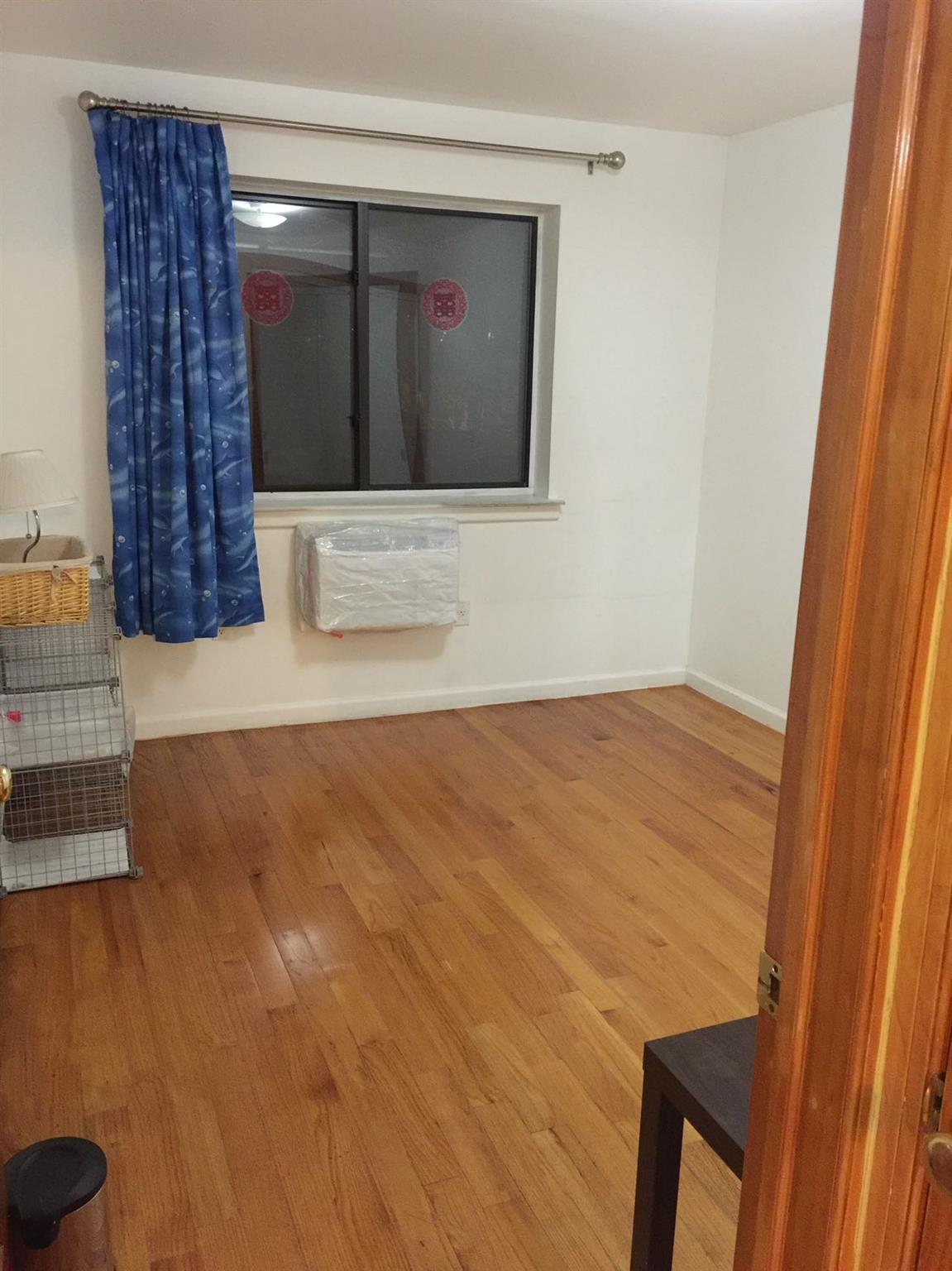 37-33 107th Street, Unit 4A Queens, NY 11368 - Photo 3 of 7 a view of an empty room