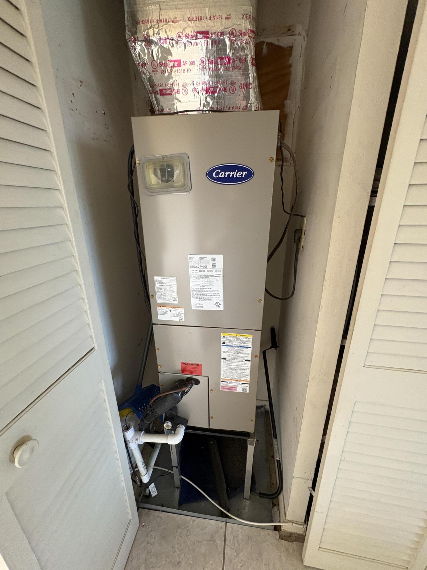 113 Waltham East West Palm Beach, FL 33417 - Photo 6 of 24 a view of washer and dryer