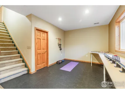a living room with a furniture and a window