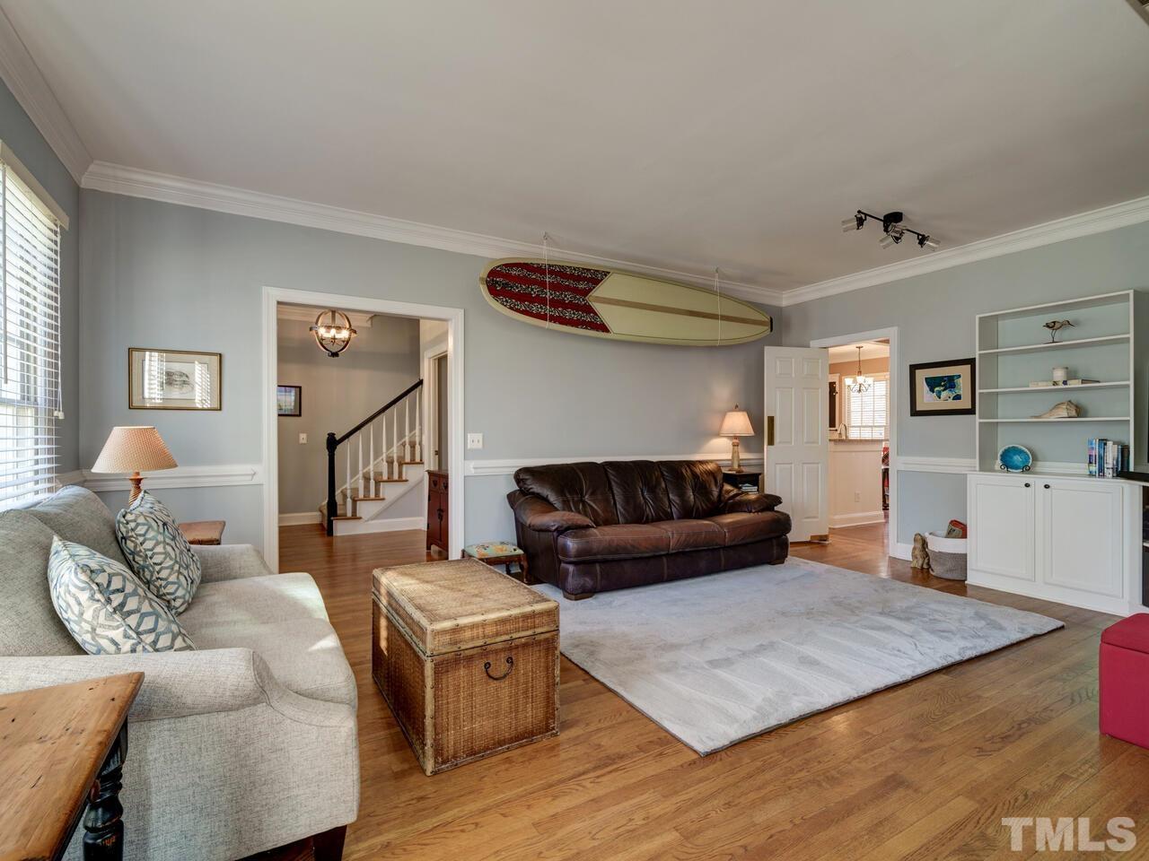 11816 Radner Way Raleigh, NC 27613 - Photo 5 of 54 a living room with furniture and wooden floor