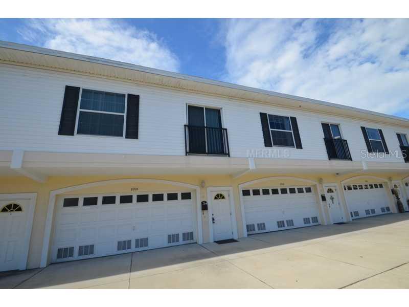 8904 Blind Pass Road, Unit 5 St. Pete Beach, FL 33706 - Photo 1 of 1 Exterior Front - Walk to St Pete Beach, Treasure Island or the historic Corey Ave restaurants and shops from this boutique, pet friendly townhome community that was built in 2003!