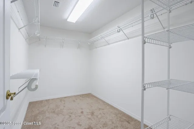 a view of a room with racks on the wall