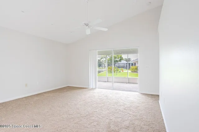 an empty room with glass door