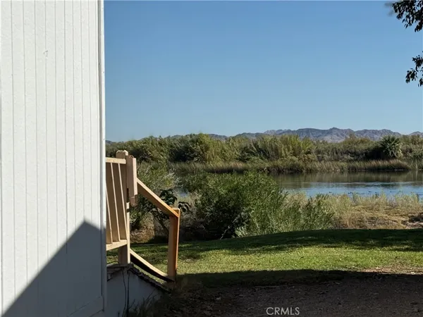 a view of swimming pool from a balcony