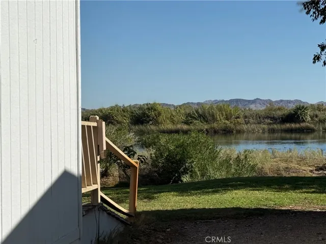 a view of swimming pool from a balcony
