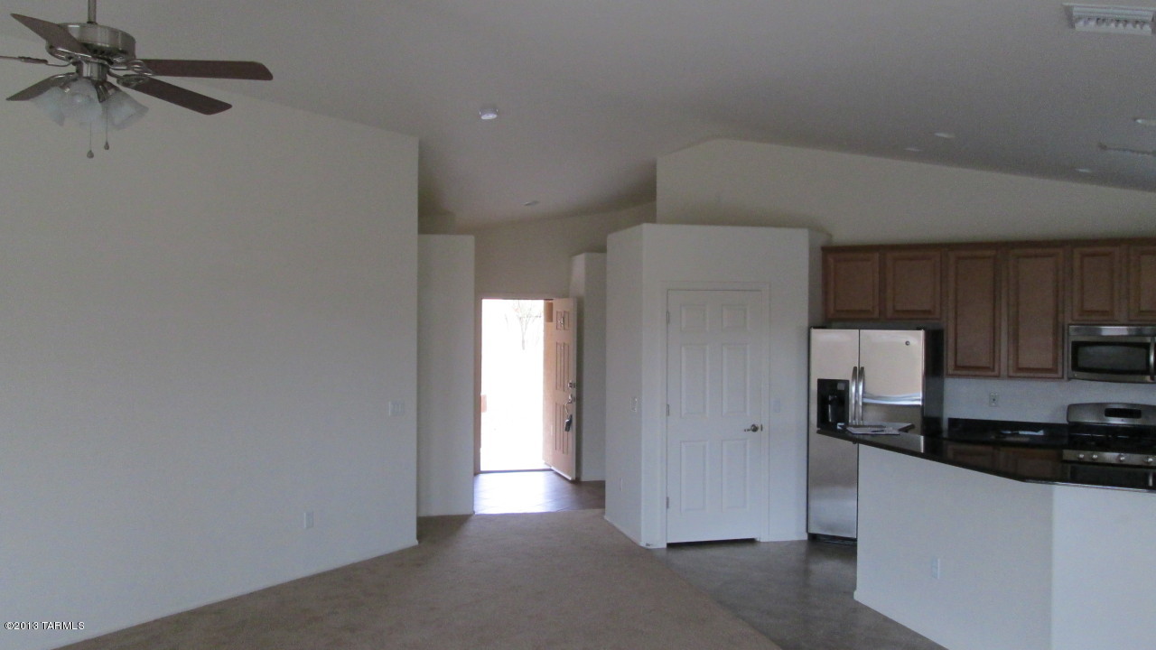 10855 East New Rock Ridge Drive Vail, AZ 85641 - Photo 6 of 34 a view of a kitchen with a sink