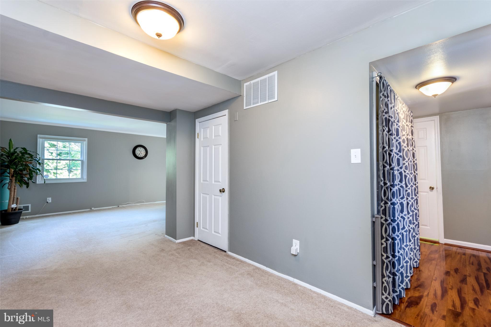 9945 Boise Road Laurel, MD 20708 - Photo 14 of 27 Dining Room leads to Living Room