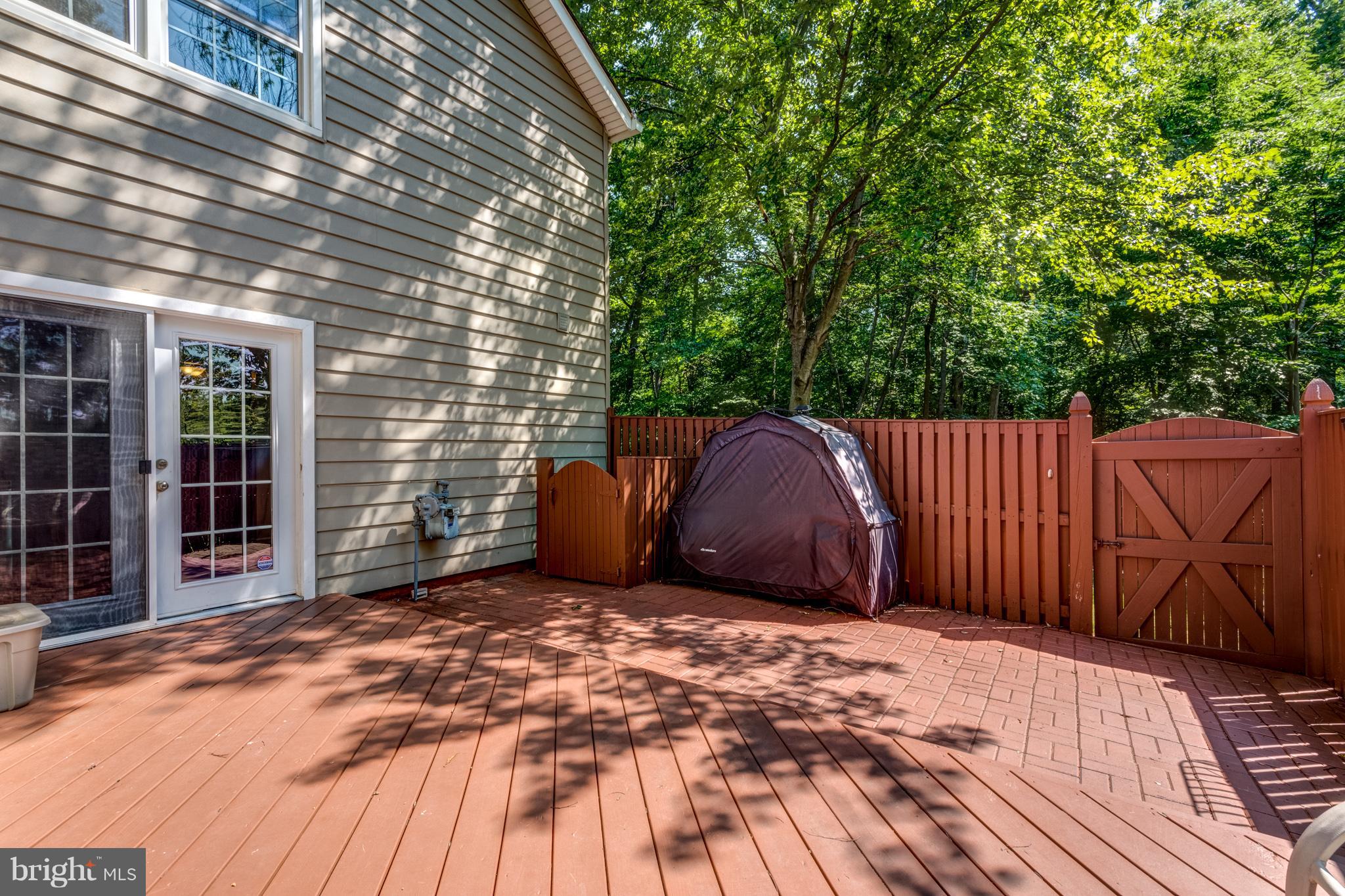 9945 Boise Road Laurel, MD 20708 - Photo 15 of 27 Fully fenced private paver patio.