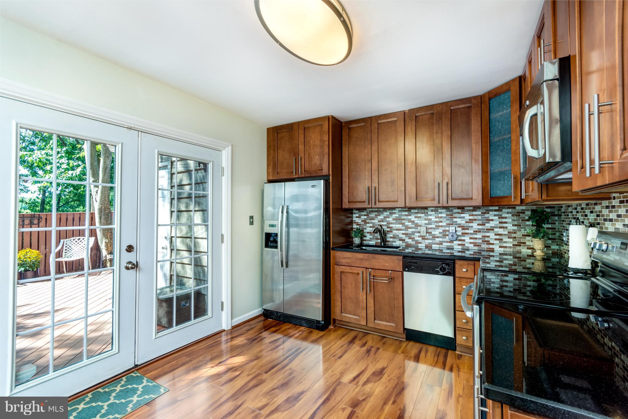 9945 Boise Road Laurel, MD 20708 - Photo 5 of 27 French doors to private fenced patio