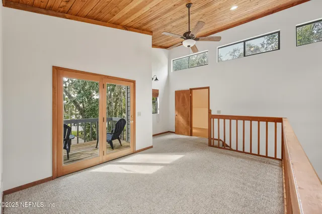 a view of a hallway with an entryway