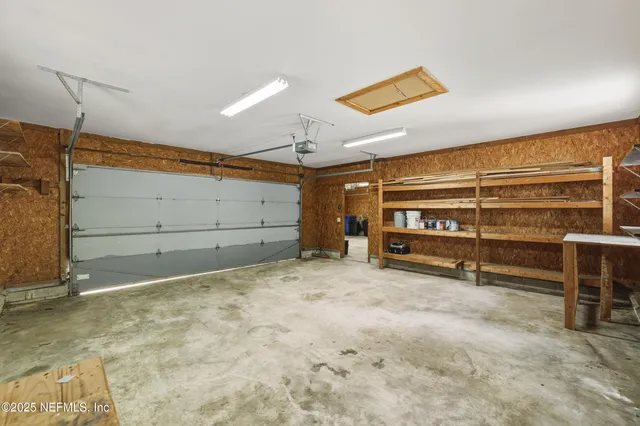 a view of room with garage