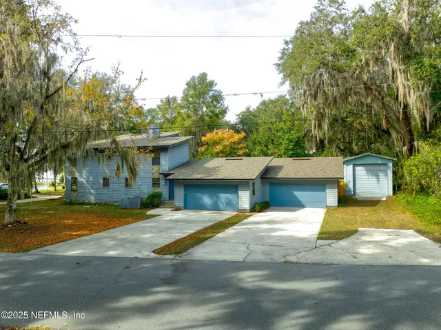 a house with trees in the background