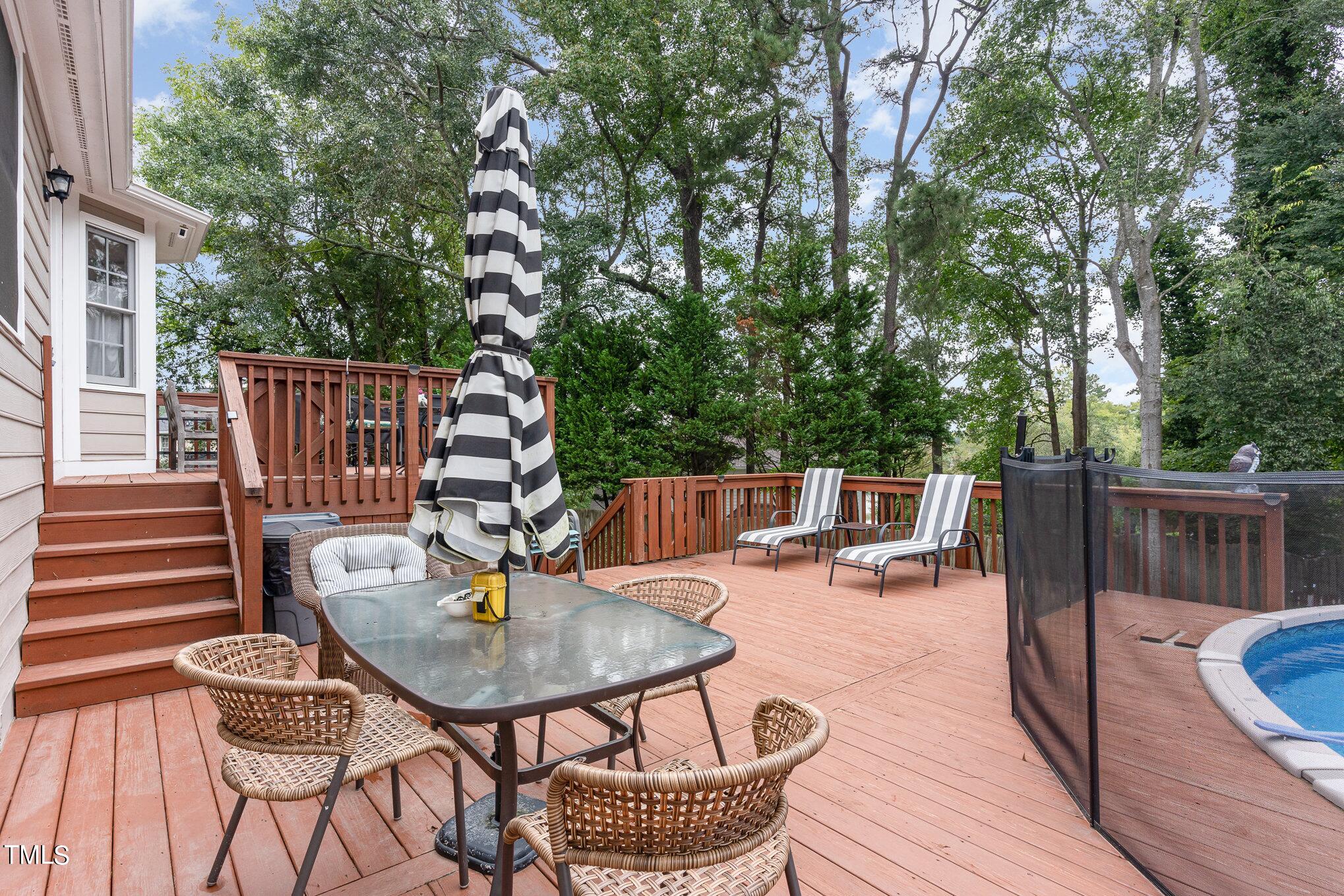 3224 Terrel Mill Road Raleigh, NC 27616 - Photo 16 of 21 a balcony with table and chairs