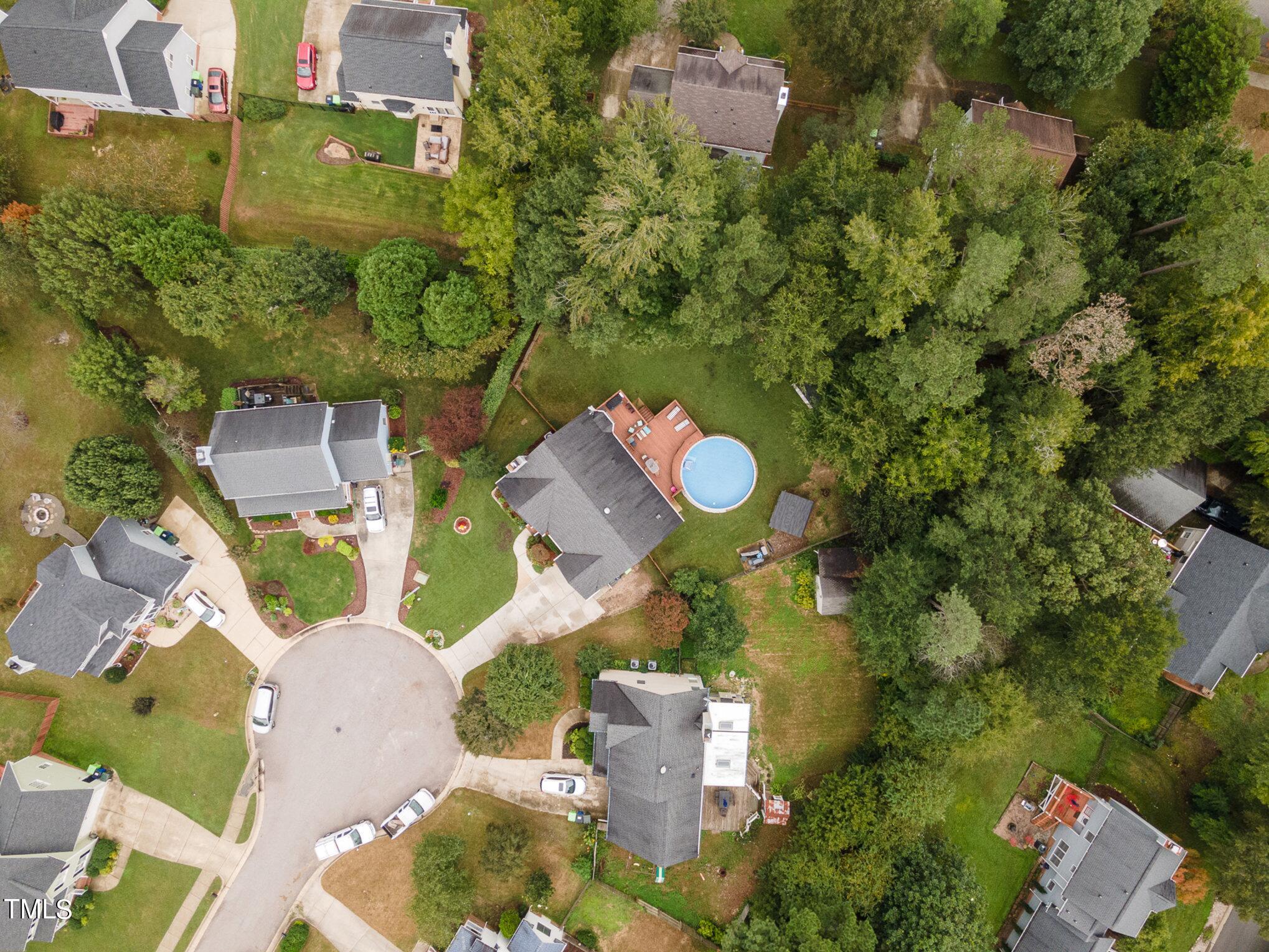 3224 Terrel Mill Road Raleigh, NC 27616 - Photo 20 of 21 an aerial view of a house with a yard and lake view