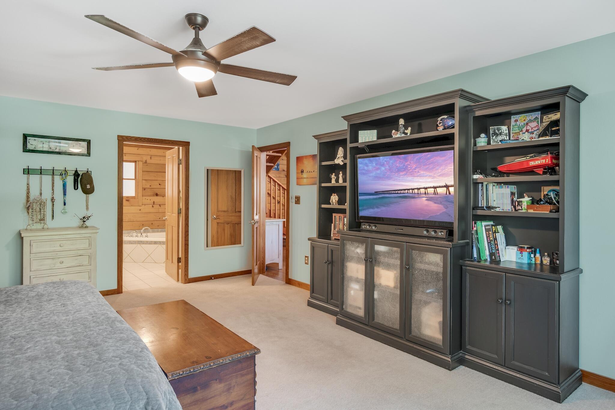 279 Pinewood Lane Inlet Beach, FL 32461 - Photo 23 of 48 a living room with furniture and a flat screen tv