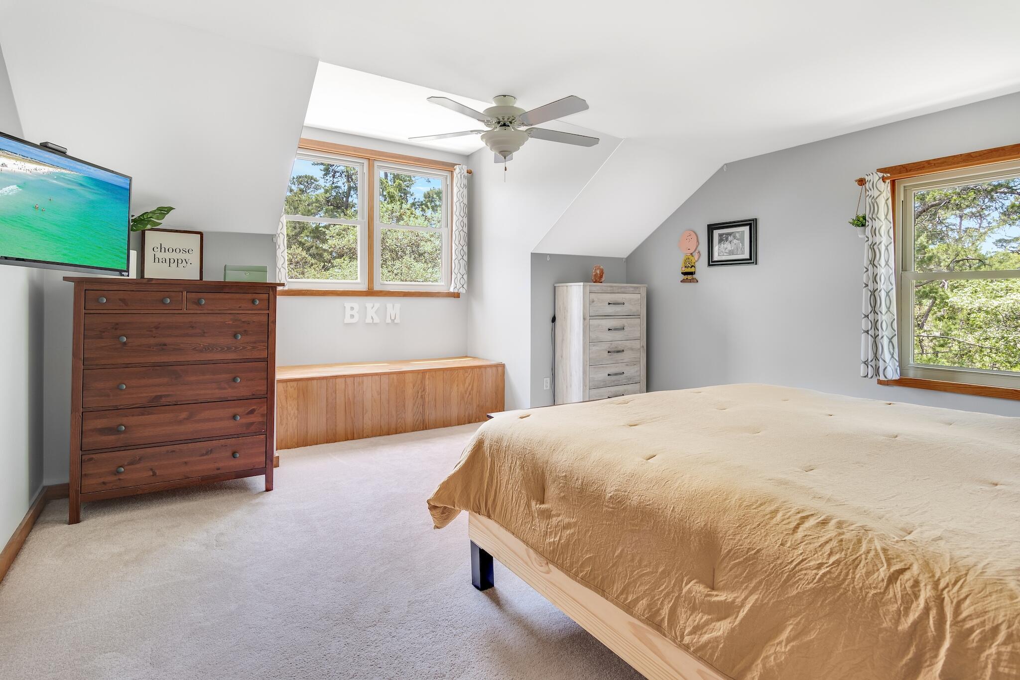 279 Pinewood Lane Inlet Beach, FL 32461 - Photo 26 of 48 a spacious bedroom with a bed and a window