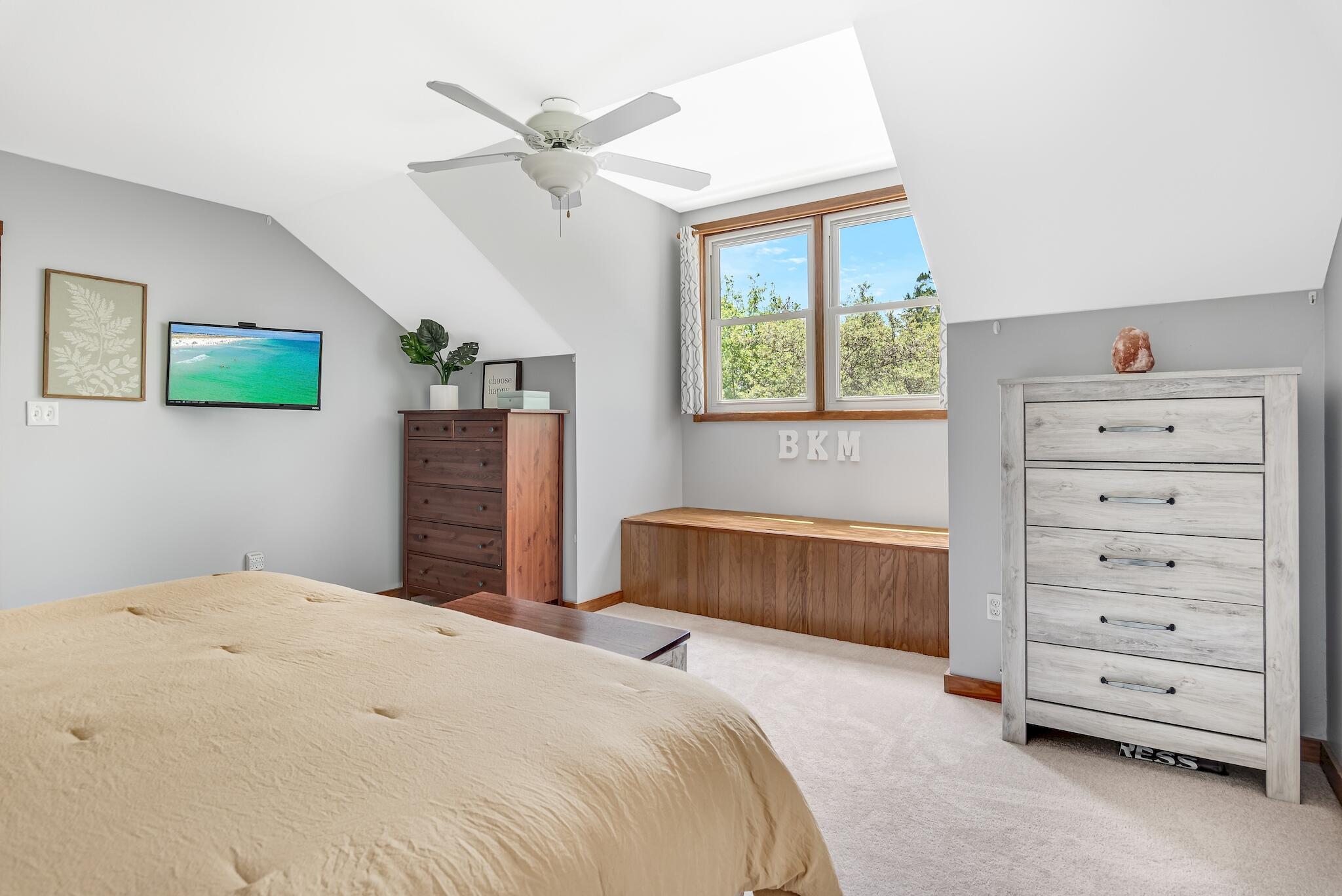 279 Pinewood Lane Inlet Beach, FL 32461 - Photo 27 of 48 a bedroom with a bed and a dresser