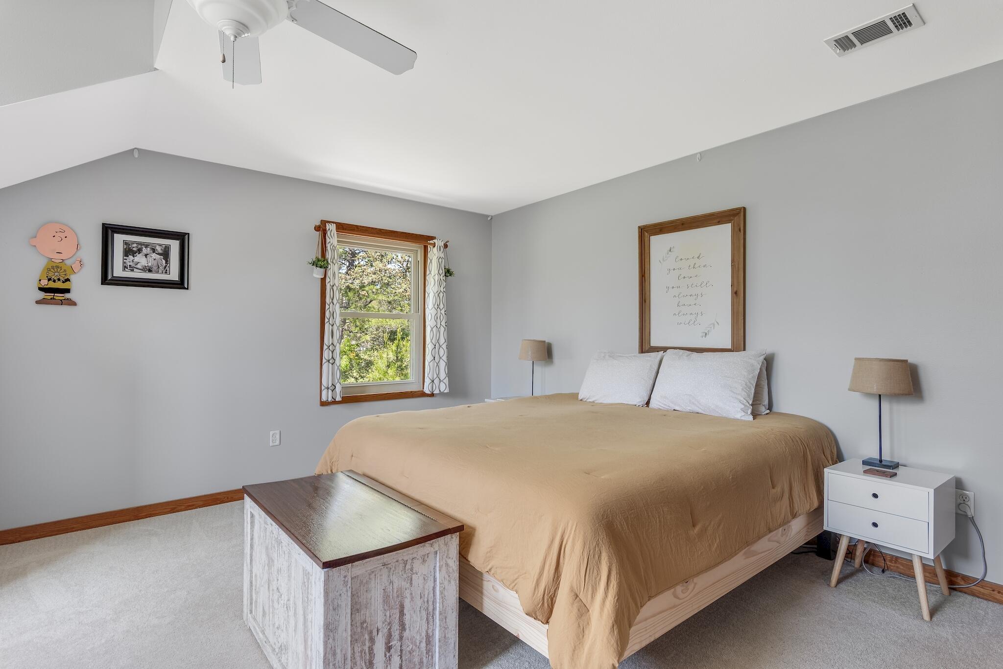 279 Pinewood Lane Inlet Beach, FL 32461 - Photo 28 of 48 a bedroom with a bed and a lamp on table
