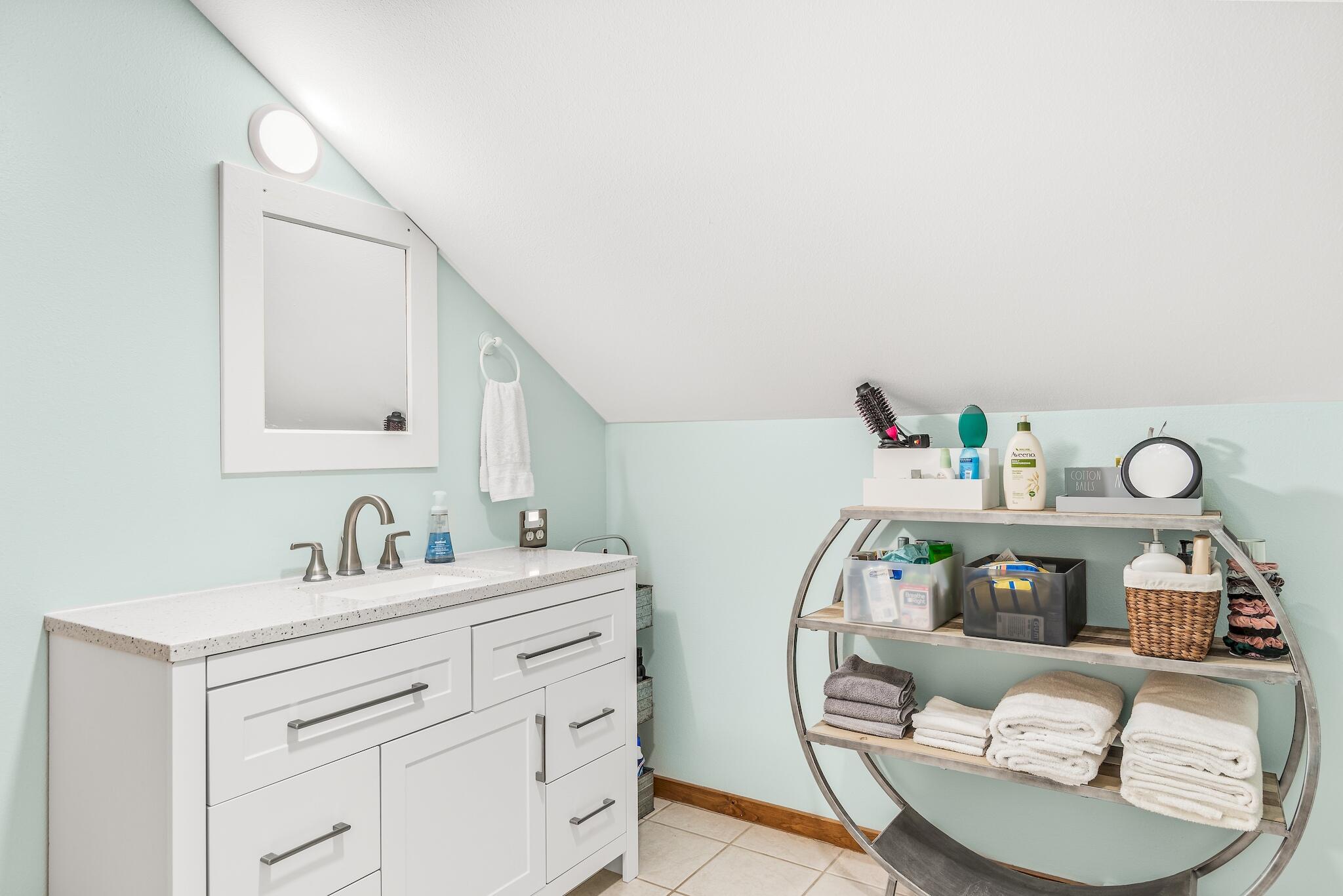 279 Pinewood Lane Inlet Beach, FL 32461 - Photo 32 of 48 a bathroom with a sink and a mirror