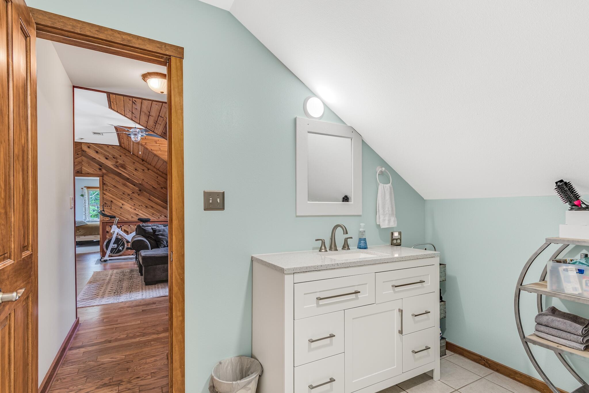 279 Pinewood Lane Inlet Beach, FL 32461 - Photo 33 of 48 a bathroom with a sink and a mirror
