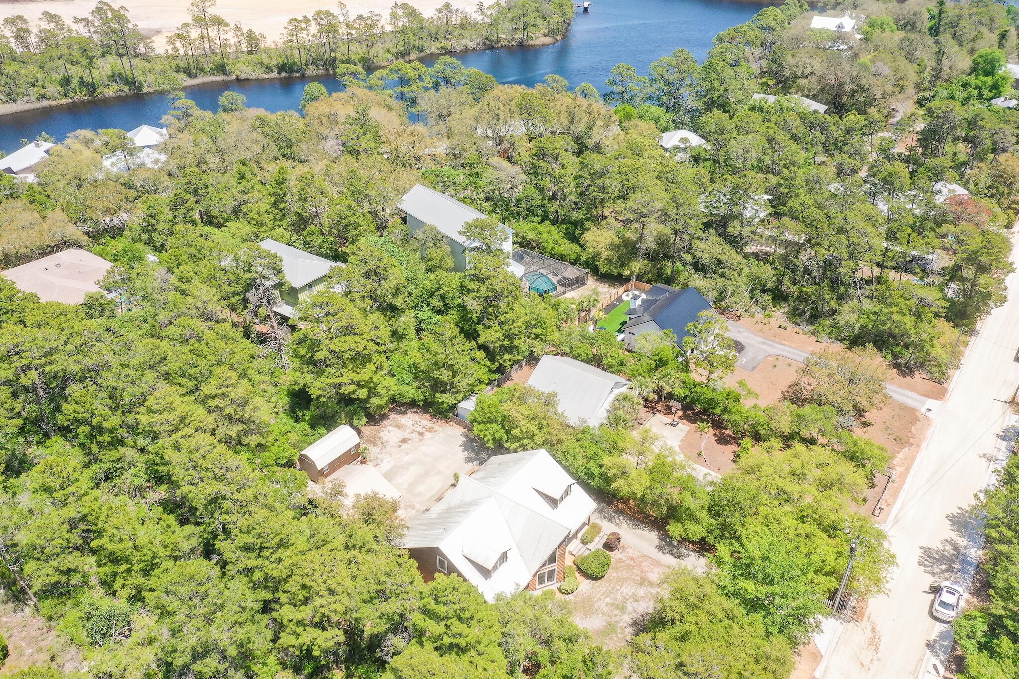 279 Pinewood Lane Inlet Beach, FL 32461 - Photo 41 of 48 a view of a lake with houses
