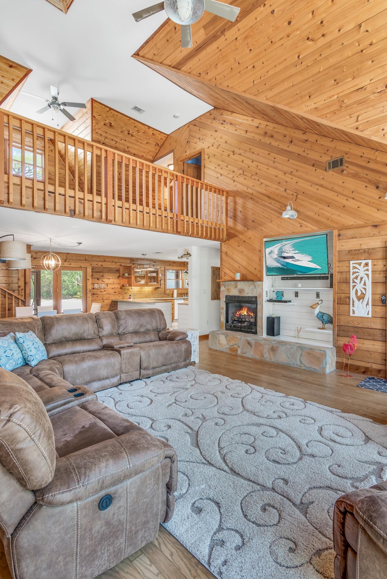 279 Pinewood Lane Inlet Beach, FL 32461 - Photo 6 of 48 a living room with furniture and a fireplace