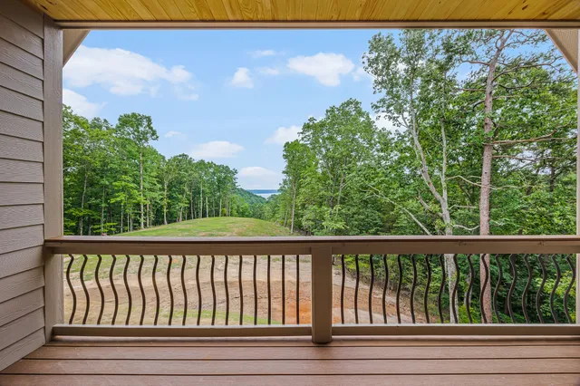 a spacious bathroom with a granite countertop sink mirror and shower