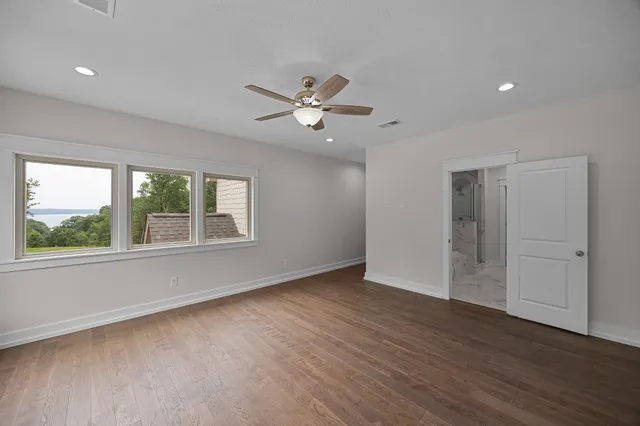 a bathroom with a granite countertop sink mirror and double