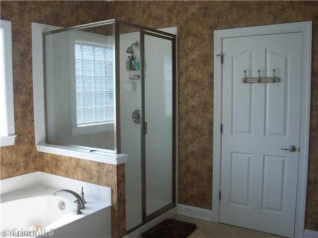8124 Hawkins Road Clemmons, NC 27012 - Photo 9 of 9 Master Bath/Spa. Large 6 cultural marble jetted tub and separate shower.