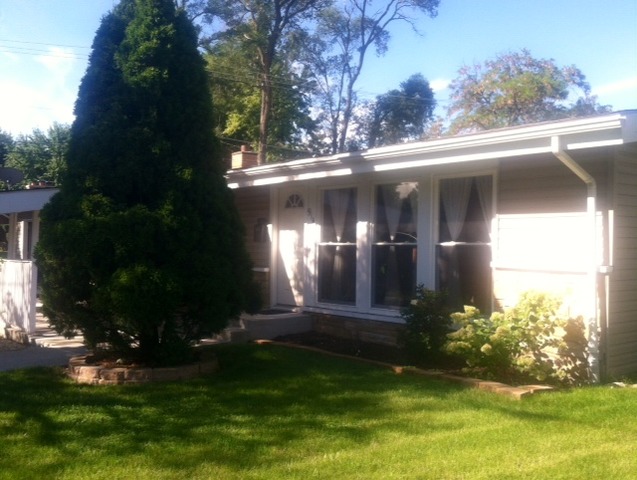 914 East Irving Park Road Itasca, IL 60143 - Photo 18 of 21 a view of a house with a yard