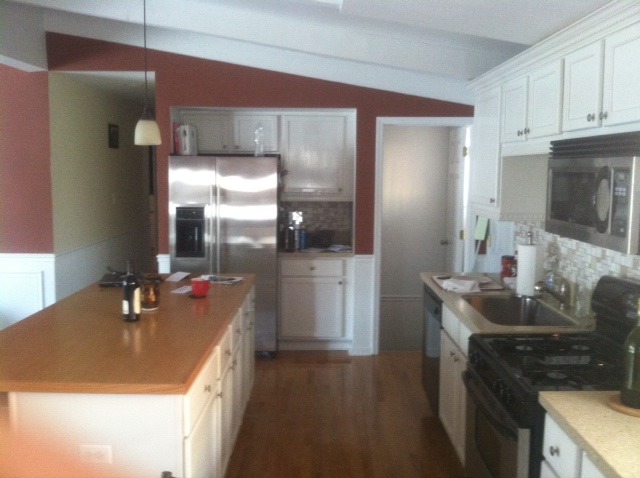 914 East Irving Park Road Itasca, IL 60143 - Photo 5 of 21 a kitchen with a sink and refrigerator