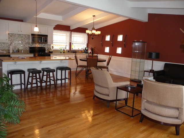 914 East Irving Park Road Itasca, IL 60143 - Photo 7 of 21 a dining room with furniture and wooden floor