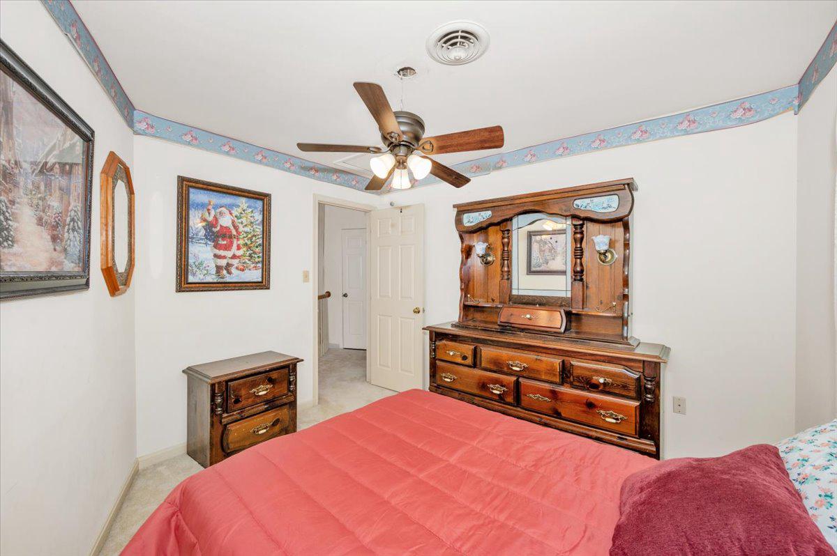 4810 Reyburn Court North Mount Airy, MD 21771 - Photo 45 of 61 a bed room with a bed and a television