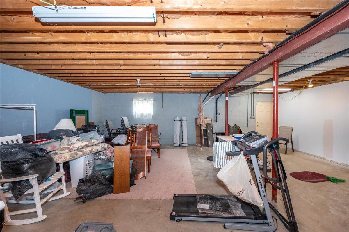 4810 Reyburn Court North Mount Airy, MD 21771 - Photo 50 of 61 a room with gym equipment and wooden floor