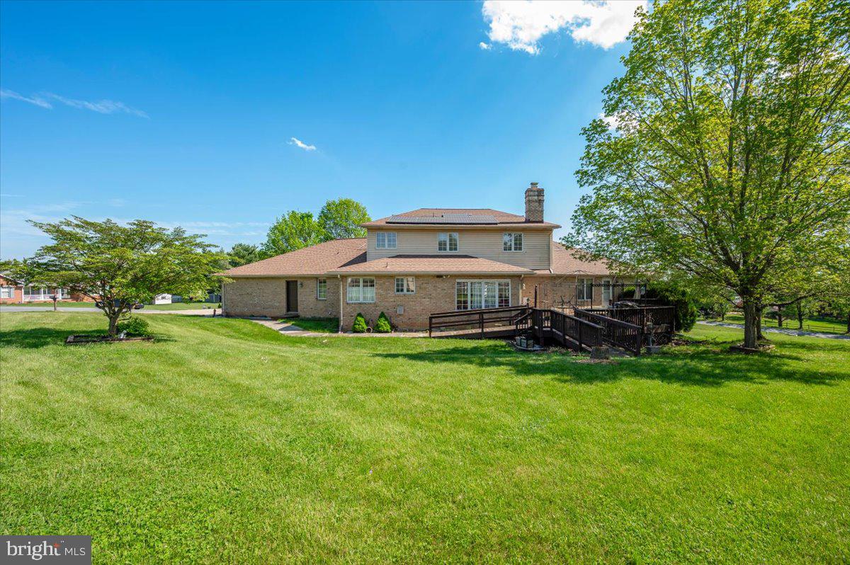 4810 Reyburn Court North Mount Airy, MD 21771 - Photo 60 of 61 a view of a house with backyard and garden