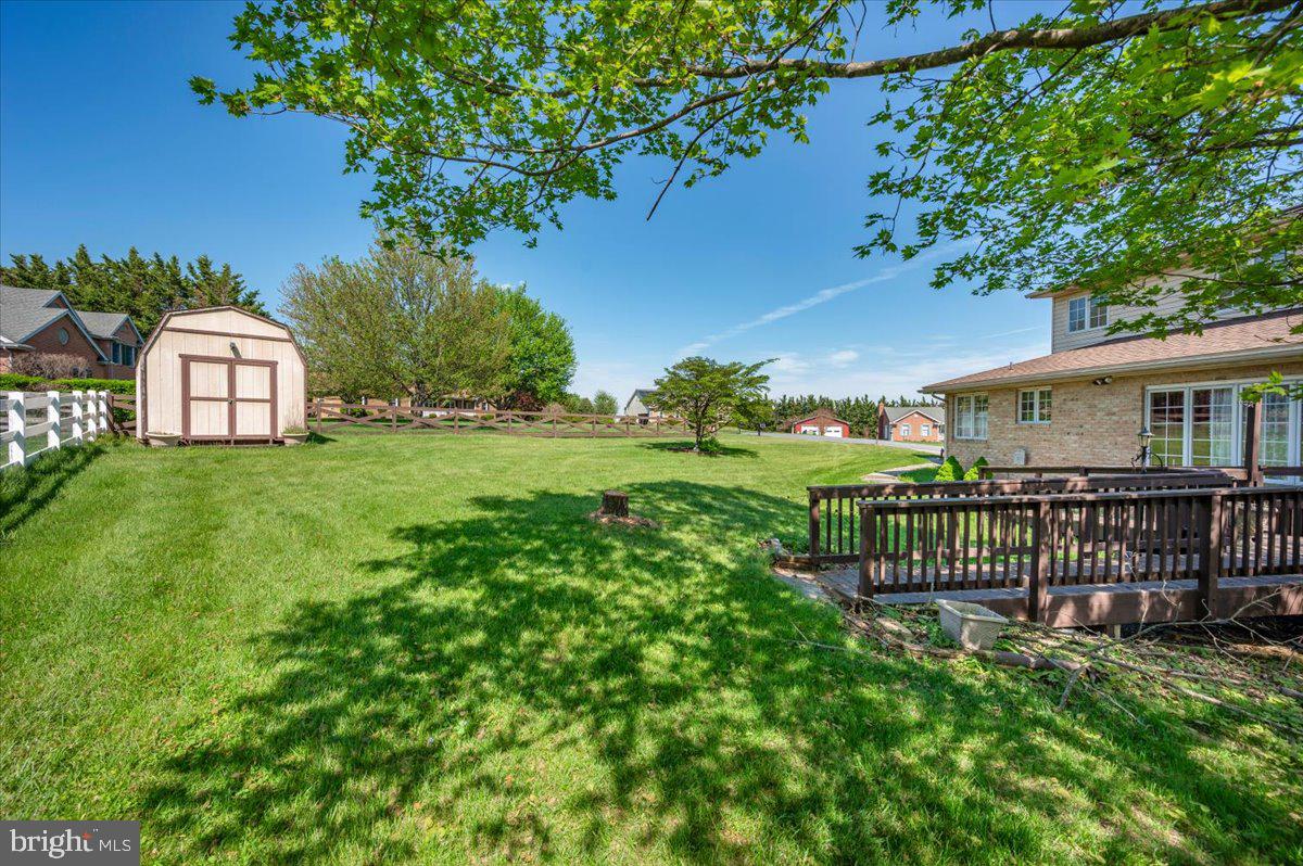 4810 Reyburn Court North Mount Airy, MD 21771 - Photo 6 of 61 a view of a house with backyard and a tree