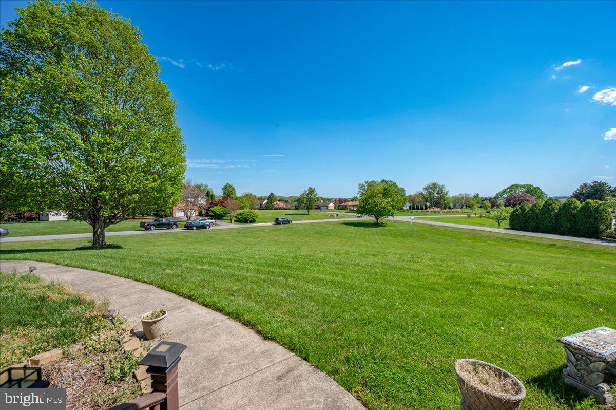 4810 Reyburn Court North Mount Airy, MD 21771 - Photo 8 of 61 a view of a grassy field with trees