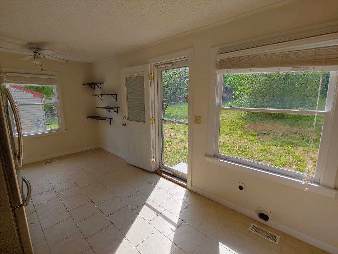 2718 Newbold Street Raleigh, NC 27603 - Photo 4 of 7 a view of an empty room with a window