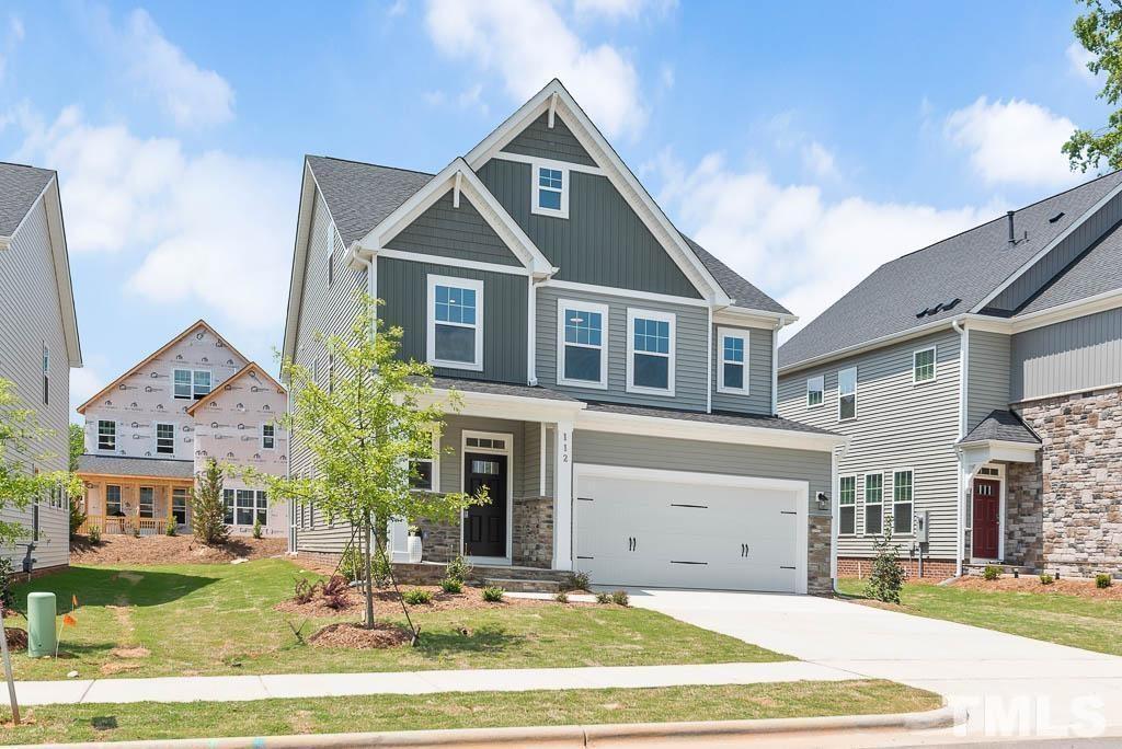 112 Thrower Lane Garner, NC 27529 - Photo 2 of 38 a front view of a house with a yard
