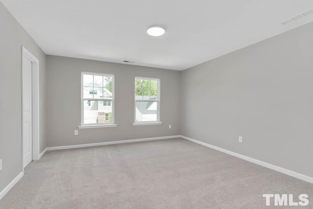 112 Thrower Lane Garner, NC 27529 - Photo 30 of 38 an empty room with windows