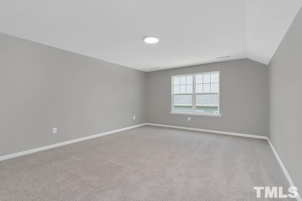 112 Thrower Lane Garner, NC 27529 - Photo 32 of 38 an empty room with windows and closet