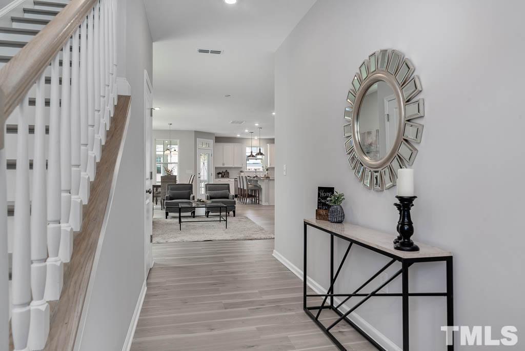 112 Thrower Lane Garner, NC 27529 - Photo 5 of 38 a living room with furniture and wooden floor