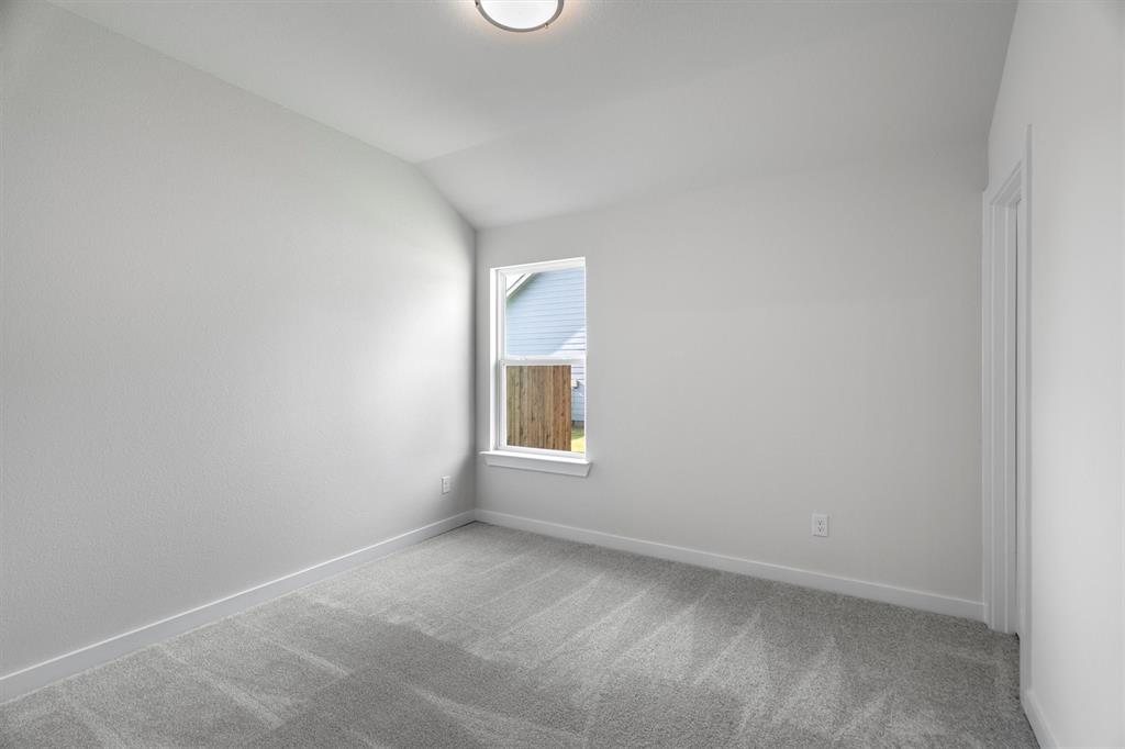 623 Kyle Drive Tioga, TX 76271 - Photo 29 of 40 an empty room with a window