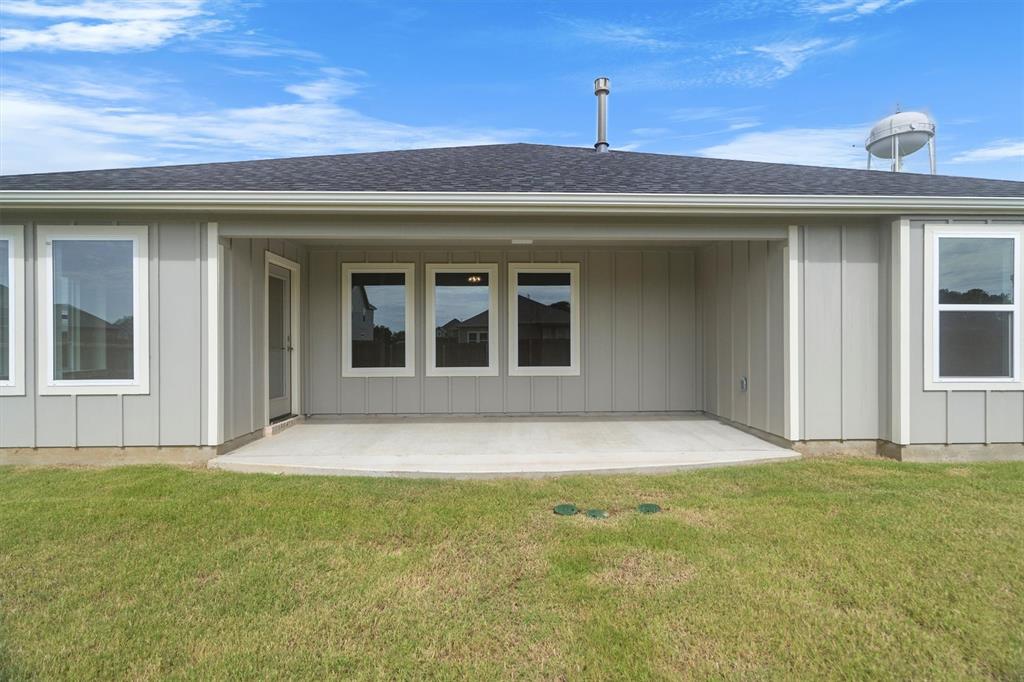 623 Kyle Drive Tioga, TX 76271 - Photo 38 of 40 a view of a house with a backyard