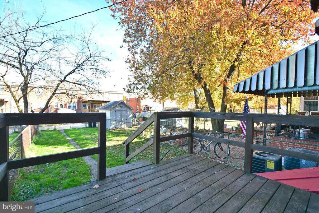 19 Cardinal Road Essex, MD 21221 - Photo 20 of 23 a view of a bench in front of house