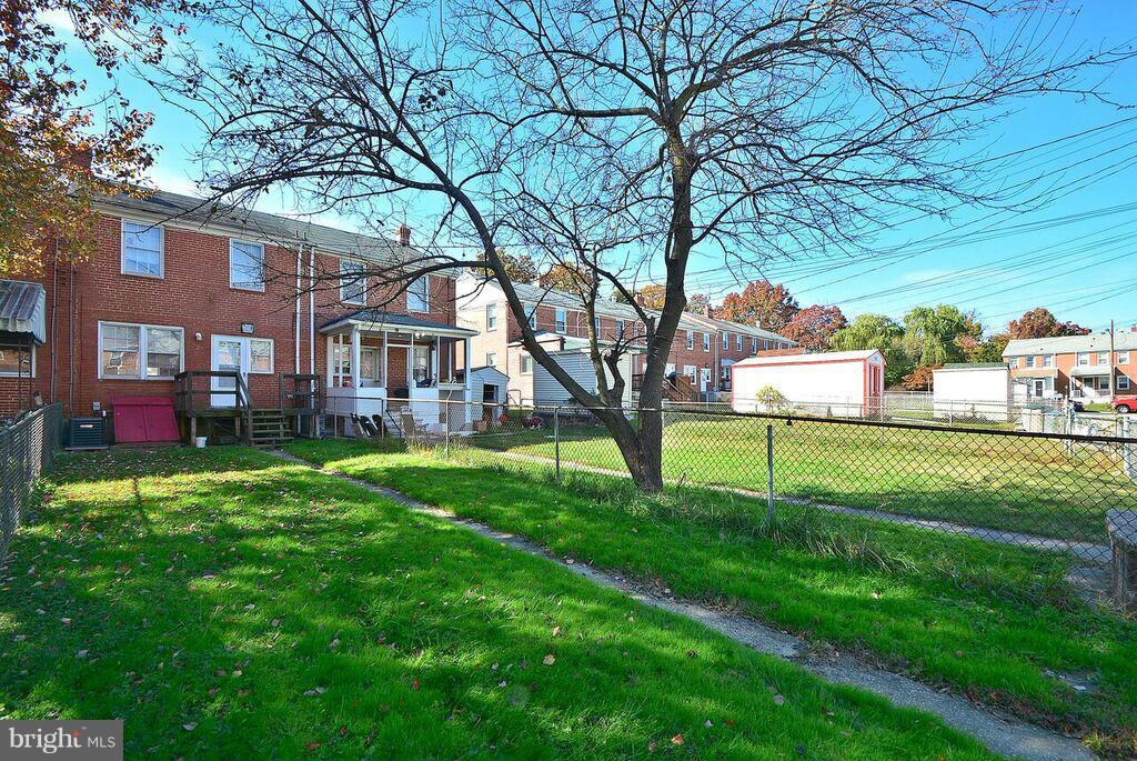 19 Cardinal Road Essex, MD 21221 - Photo 22 of 23 a view of a house with a backyard