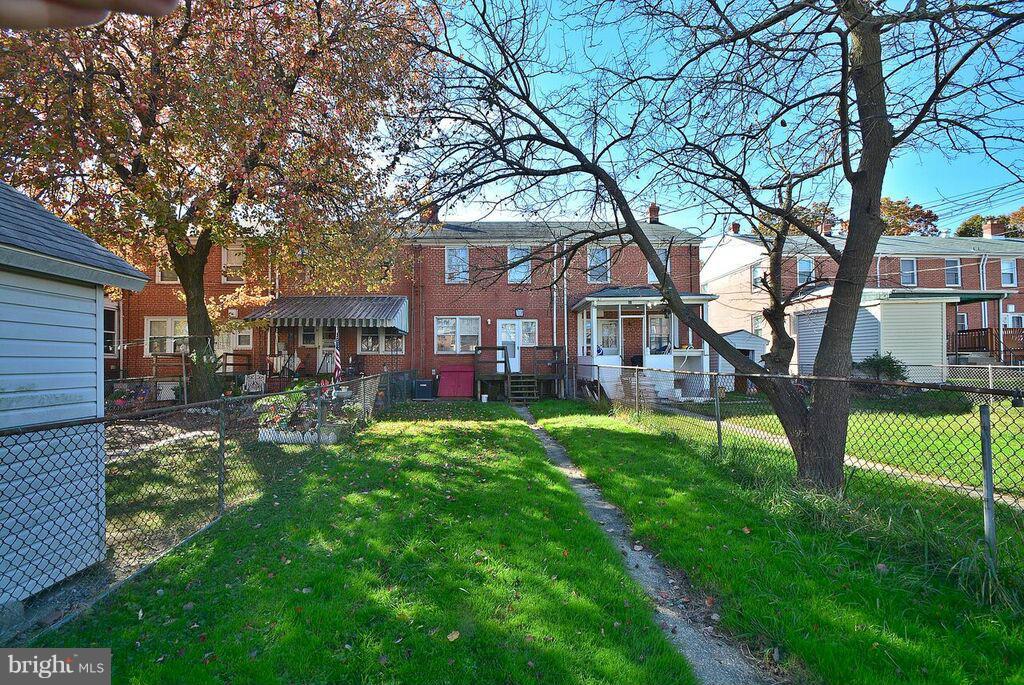 19 Cardinal Road Essex, MD 21221 - Photo 23 of 23 a front view of a house with garden