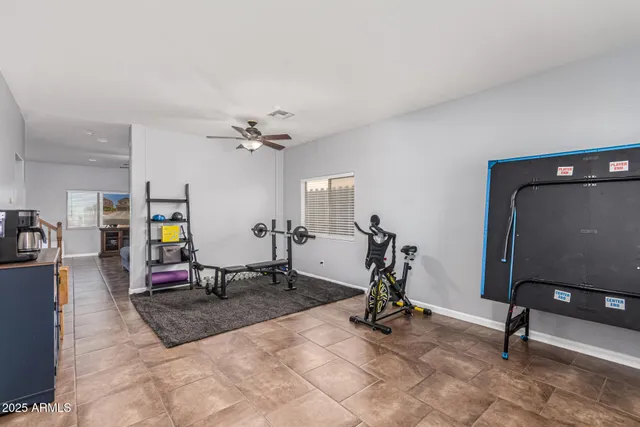 a living room with a couch and a flat screen tv
