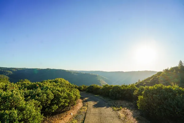 a view of a lake with a mountain in the background
